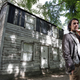 In this Aug. 23, 2017, photo, American artist Ryan Mendoza poses in front of the rebuilt house of Rosa Parks in Berlin. Parks’ house has been standing in the German capital for less than a year, but now Mendoza, who saved it from destruction in Detroit, says it’s time for it to return to the U.S. (Michael Sohn/AP Images)